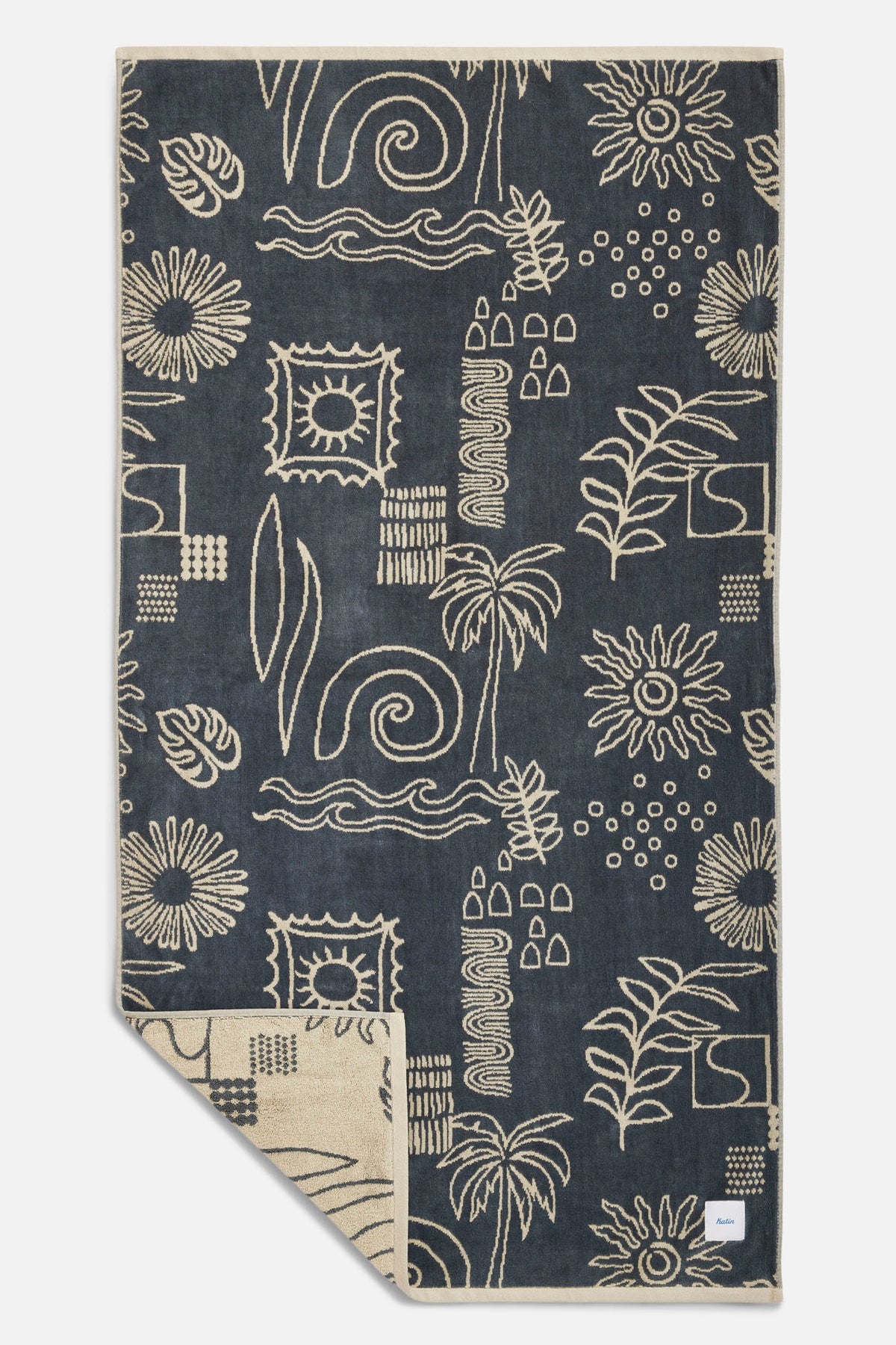 Towel with abstract patterns on a blue background
