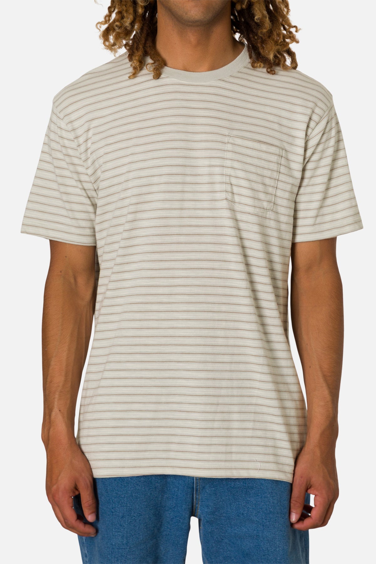 Person wearing a beige striped t-shirt on a white background