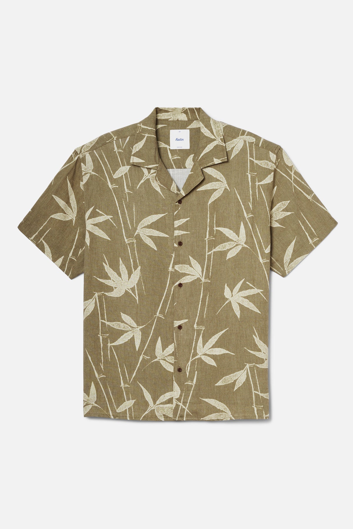 Moss colored shirt with  bamboo pattern on a white background