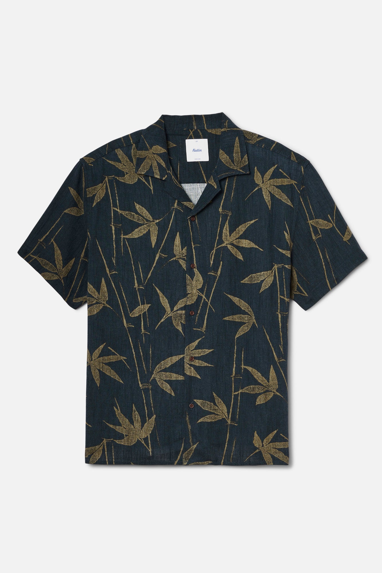 Black shirt with gold bamboo pattern on a white background