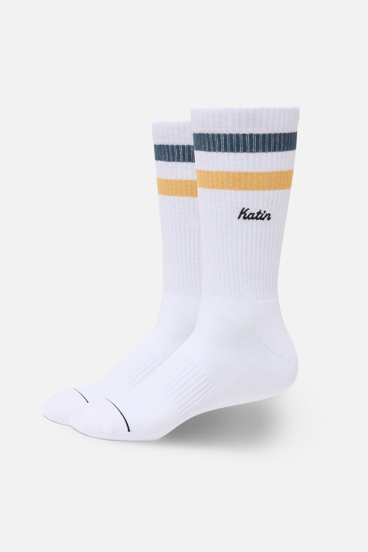 White socks with gray and gold stripes on a white background