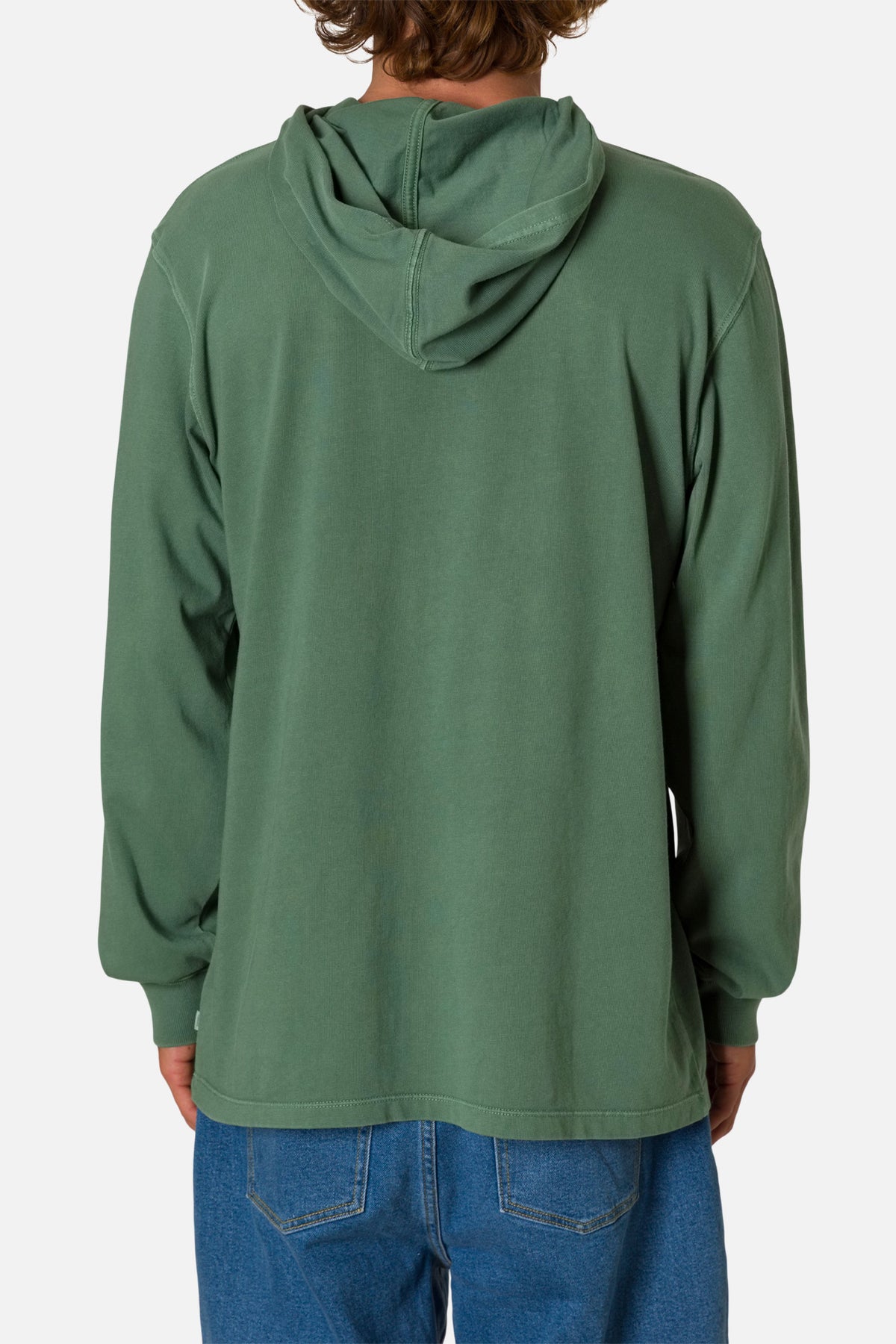 Back of erson wearing a green hoodie and blue jeans on a white background