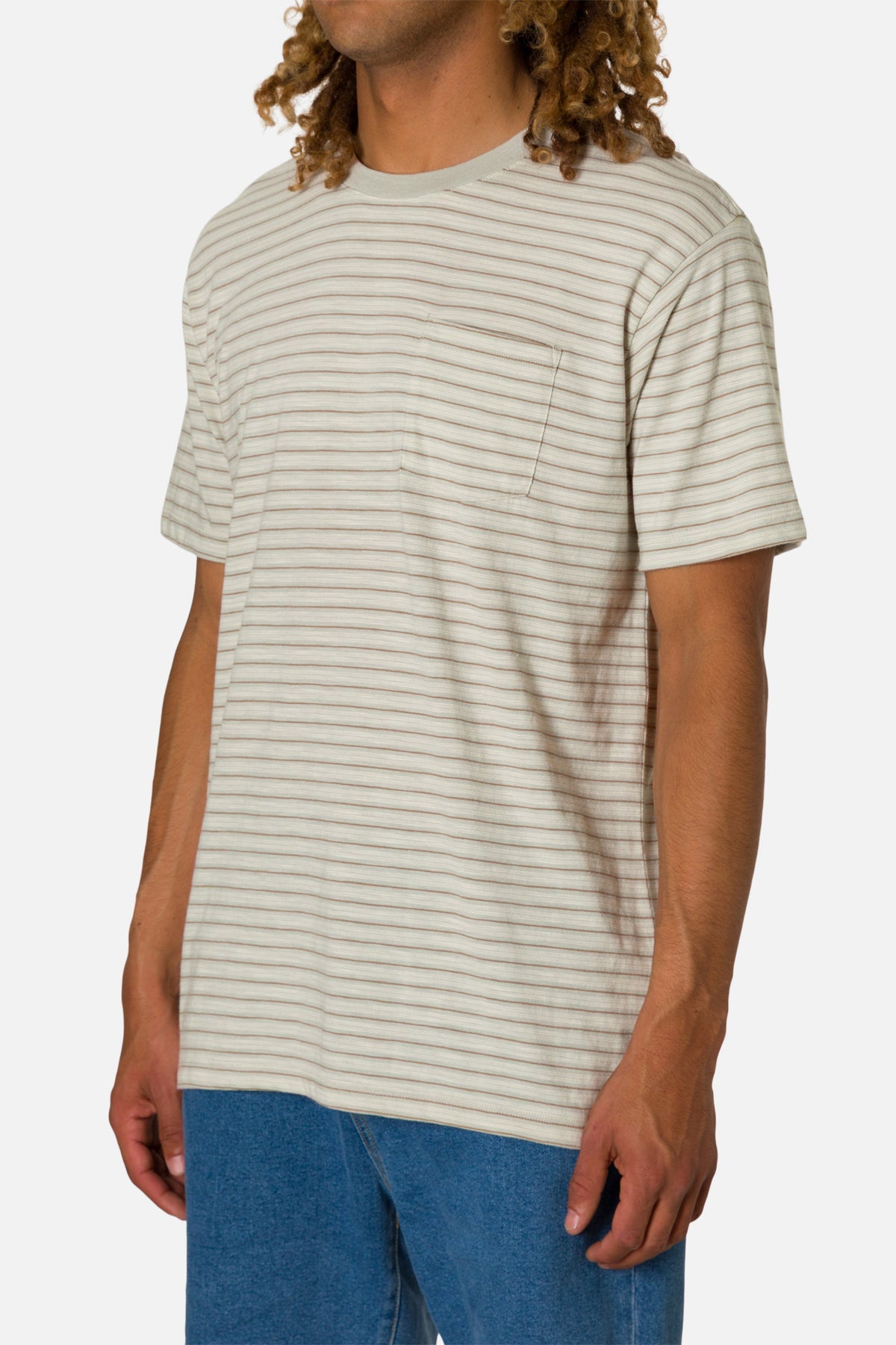 Person wearing a striped t-shirt and blue jeans on a white background